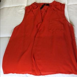 Orange sleeveless blouse
